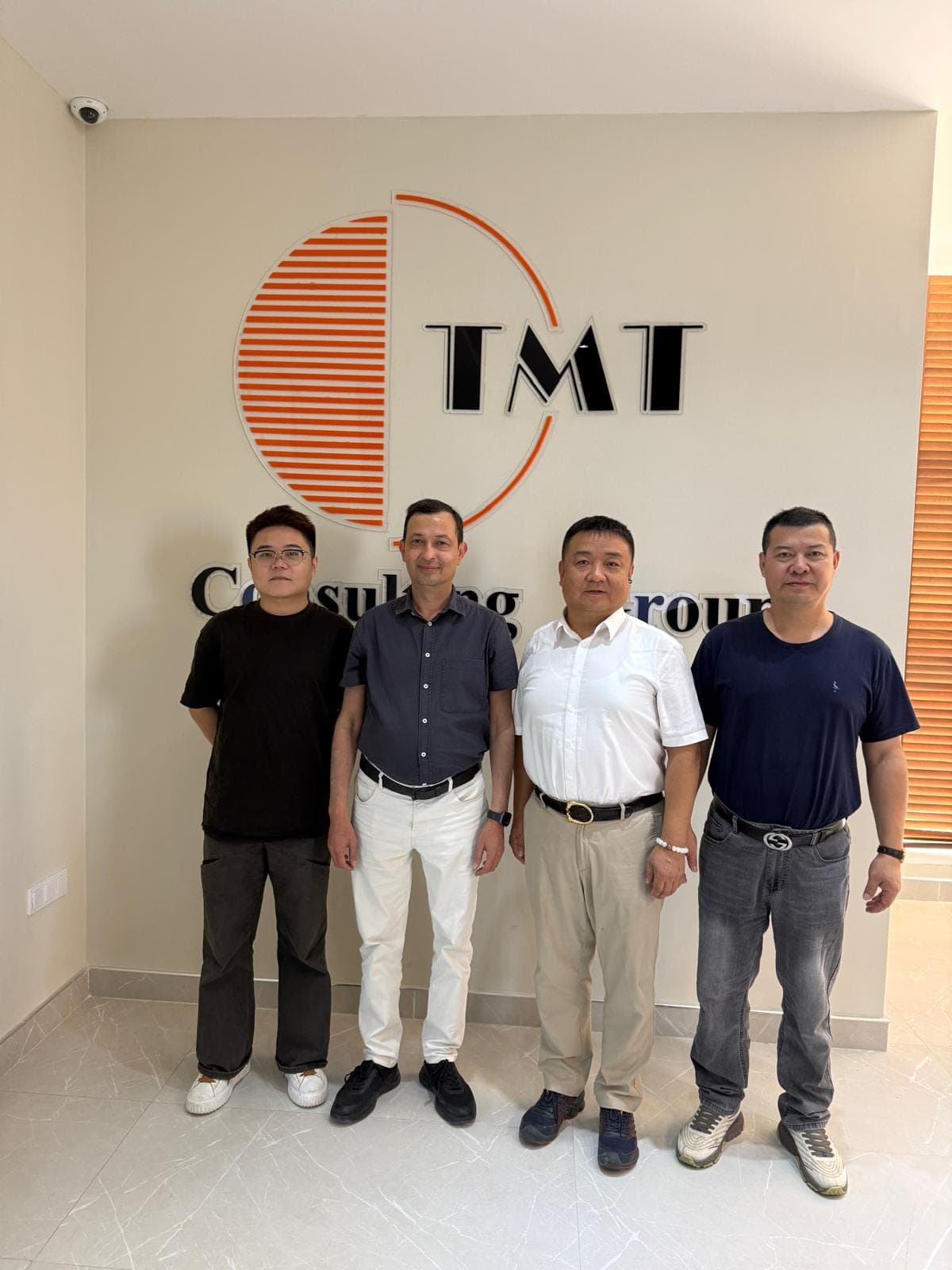 Meeting Between Representatives of TMT Consulting Group and a Chinese Delegation